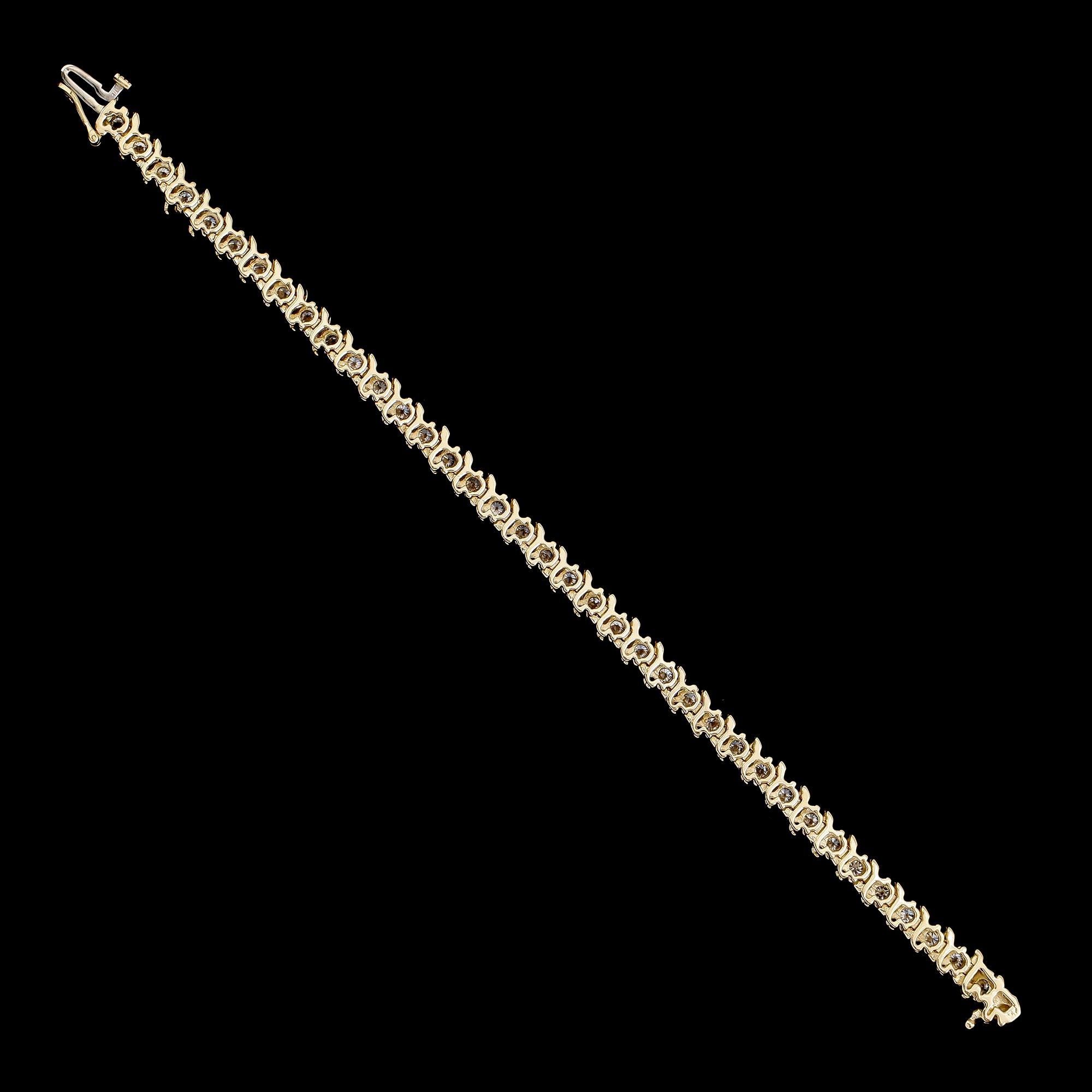 ARMBAND, 14 k guld, briljantslipade diamanter tot ca 5.40 ct.