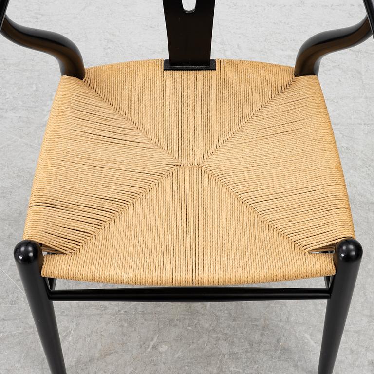 Hans J. Wegner, four CH24/ "Wishbone" chairs, Carl Hansen & Son, Denmark, 21st century.