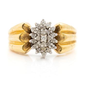 18K gold ring with diamonds.
