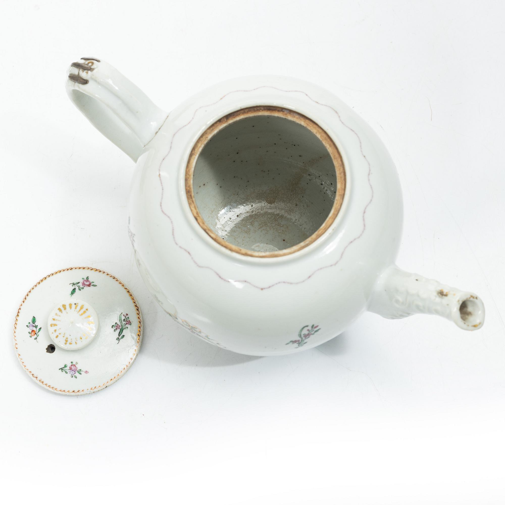 Cups and saucers, 11+7, and a teapot in famille rose with monogram, company porcelain, China, 18th century.
