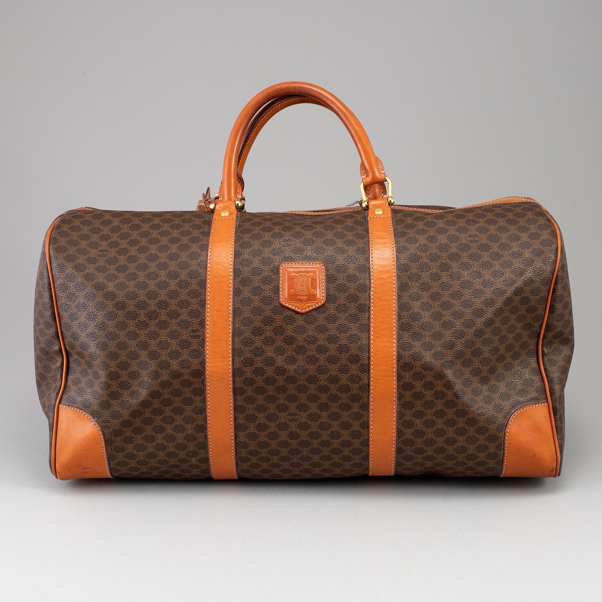 CÉLINE, a 'Macadam Duffle' bag.