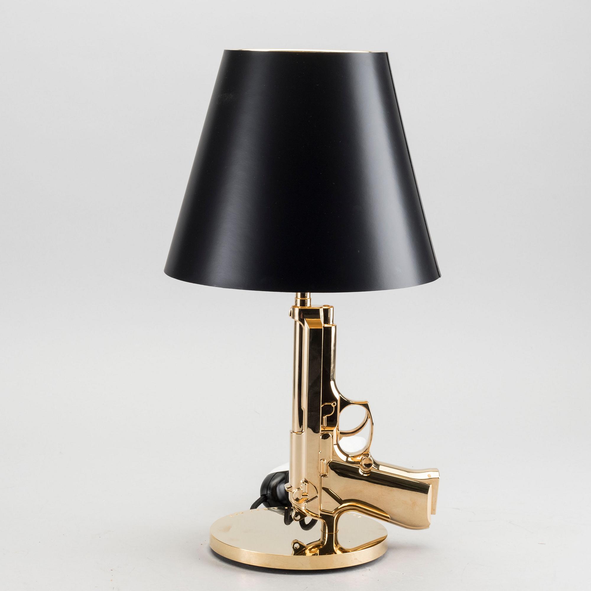 PHILIPPE STARCK, "Gun bedside Lamp", Flos.