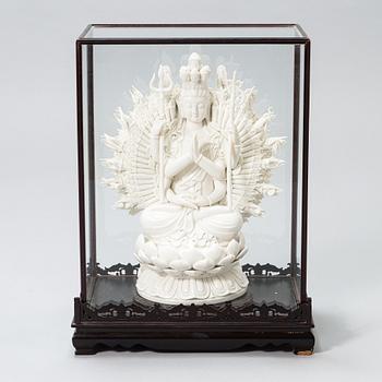 An oriental Buddha statue in porcelain.