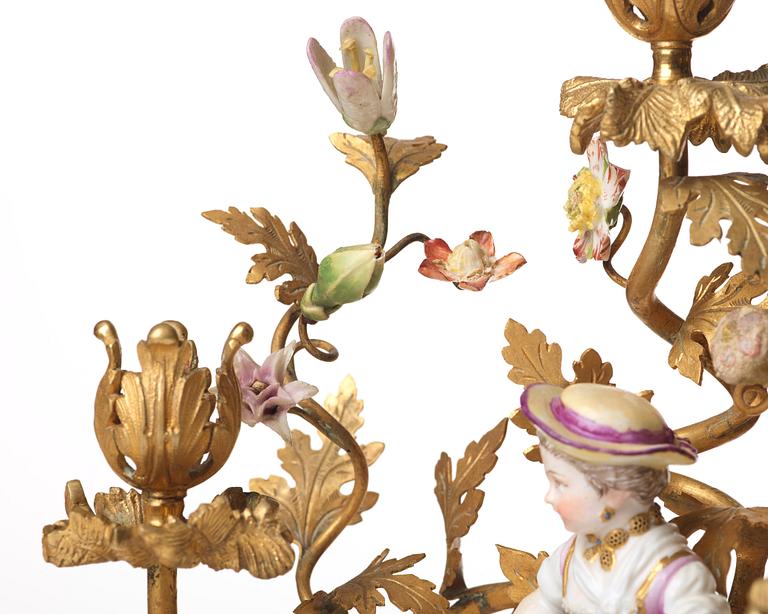 A pair of Meissen Rococo-style three-light candelabra, second half of the 1800's.