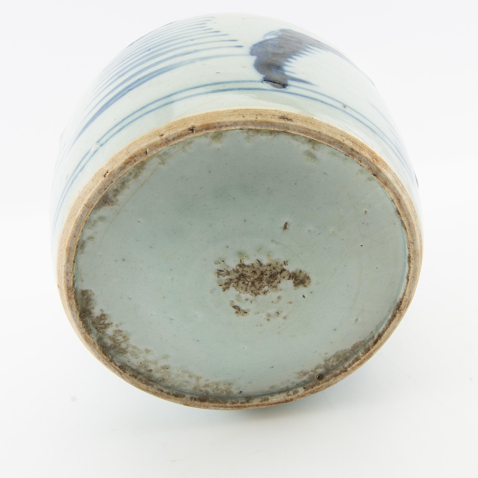 A blue and white jar, 20th century.