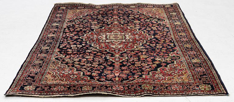 A semi-antique Sarouk rug, west Persia, c. 205 x 131 cm.