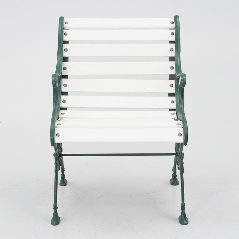 Garden bench, armchair and table, 20th century.