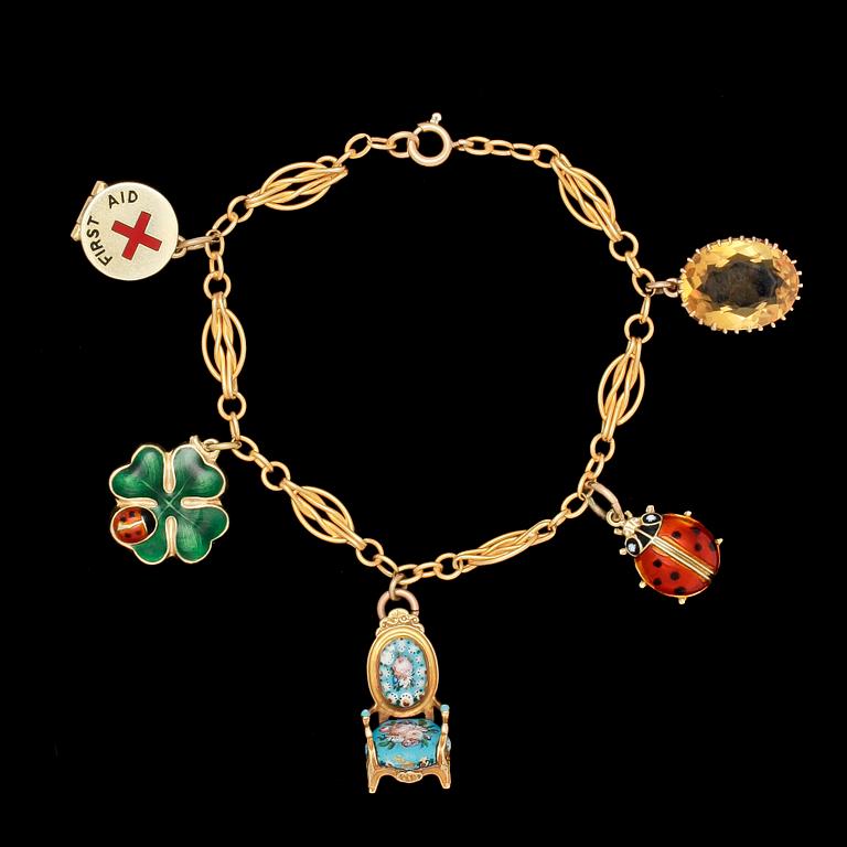 CHARMBRACELET, 14k gold and some charms 9 k. Weight 18,5 g.