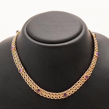 Necklace with x-link 18K gold and cabochon-cut amethysts, Anetoft & Persson Stockholm 1961.