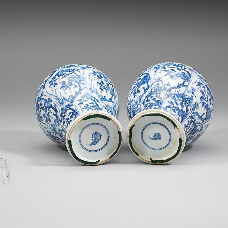 Two blue and white vases with covers, Qing dynasty, 18th Century.