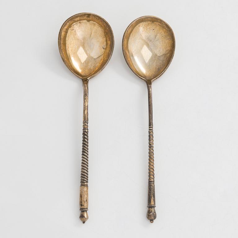 Two 19th-century parcel-gilt silver spoons, Moscow 1877-98.