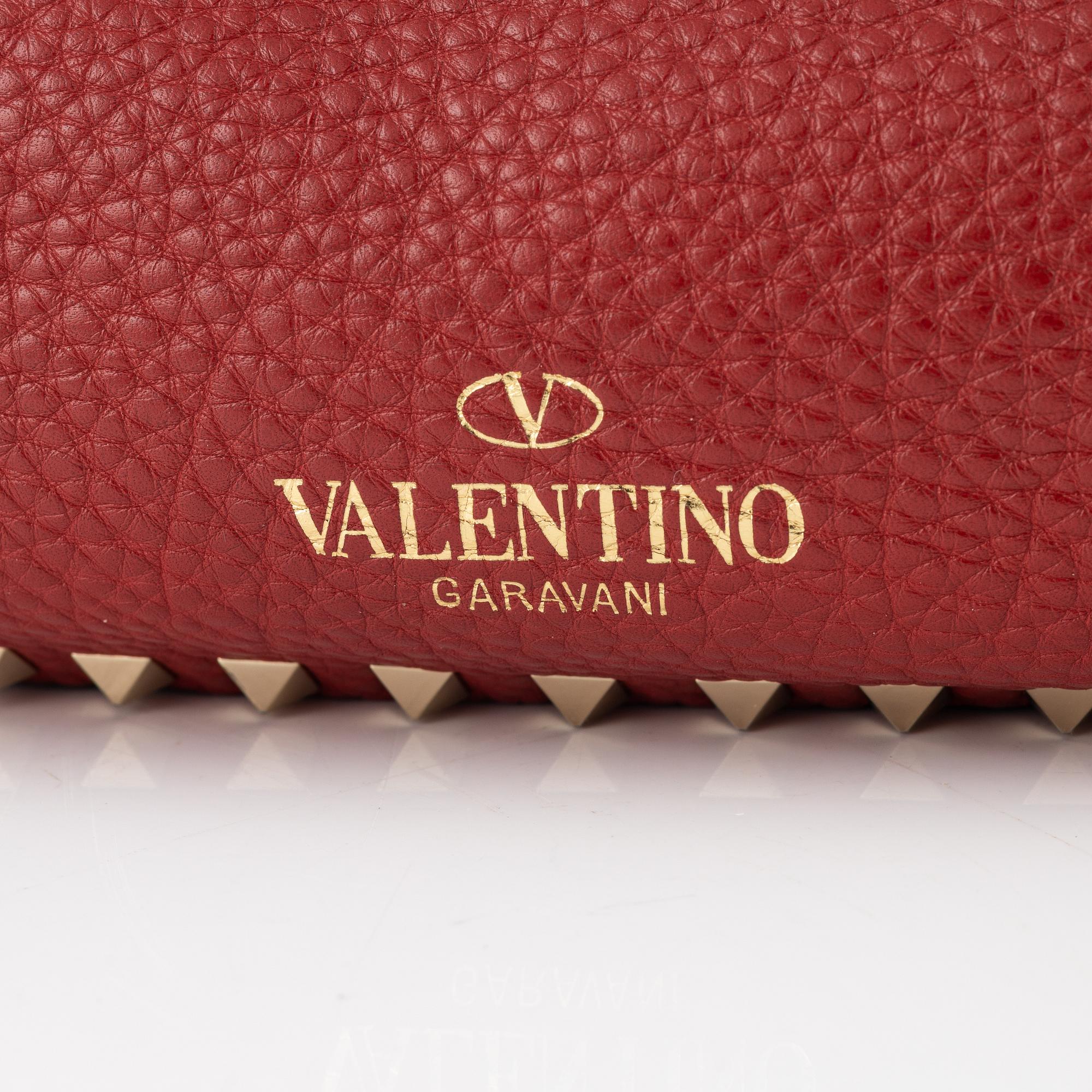 Valentino Gravani, a red leather studded tote bag, 2018.