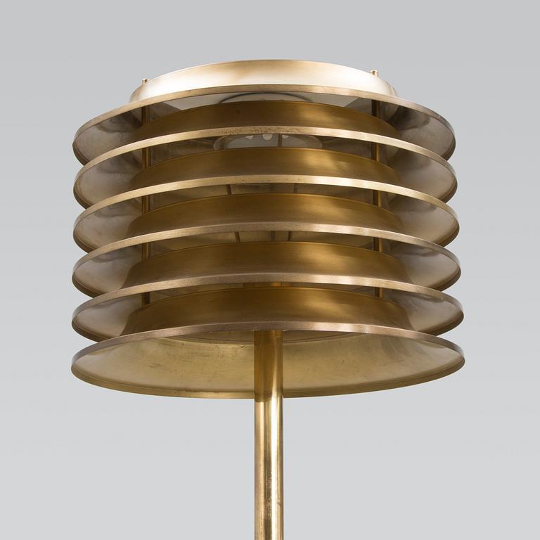 A 1970's floor lamp by Kai Ruokonen for Orno, Finland.