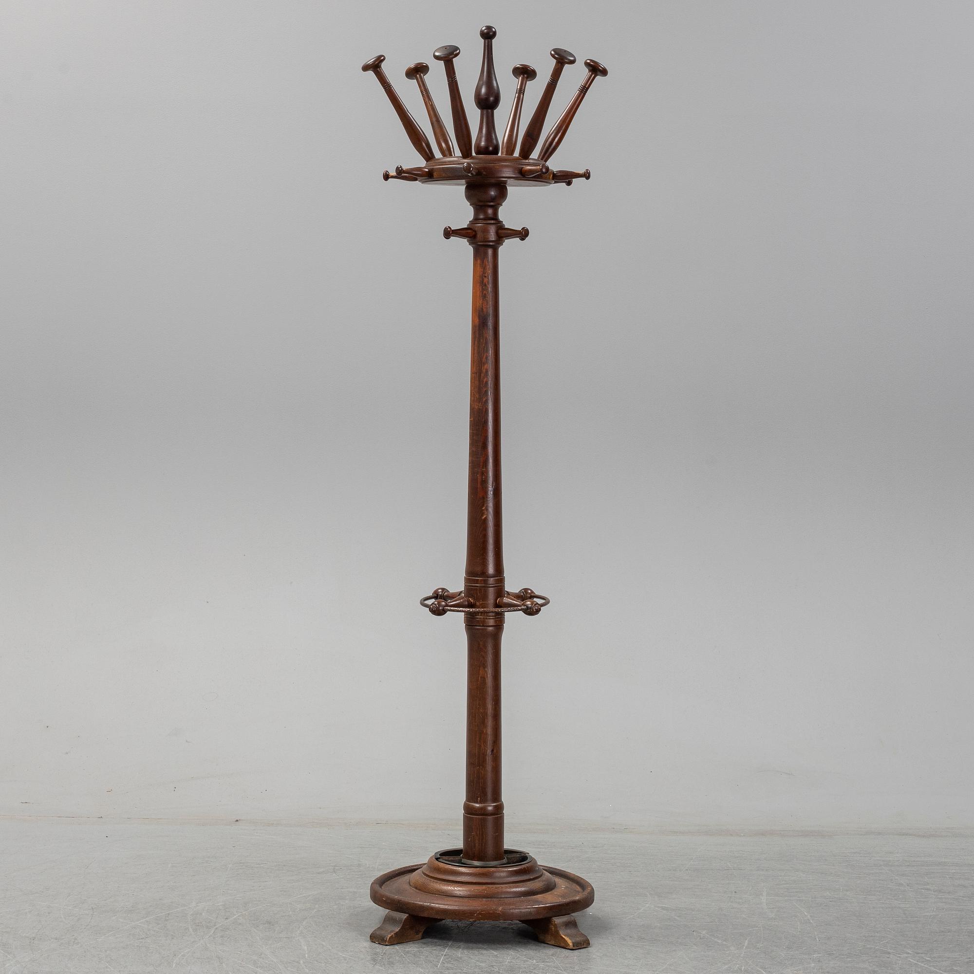 A stained pine clothes hanger, first half of the 20th century.