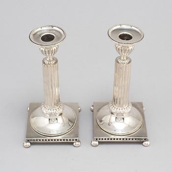 LJUSSTAKAR, ett par, silver, GAB, Stockholm, 1919.