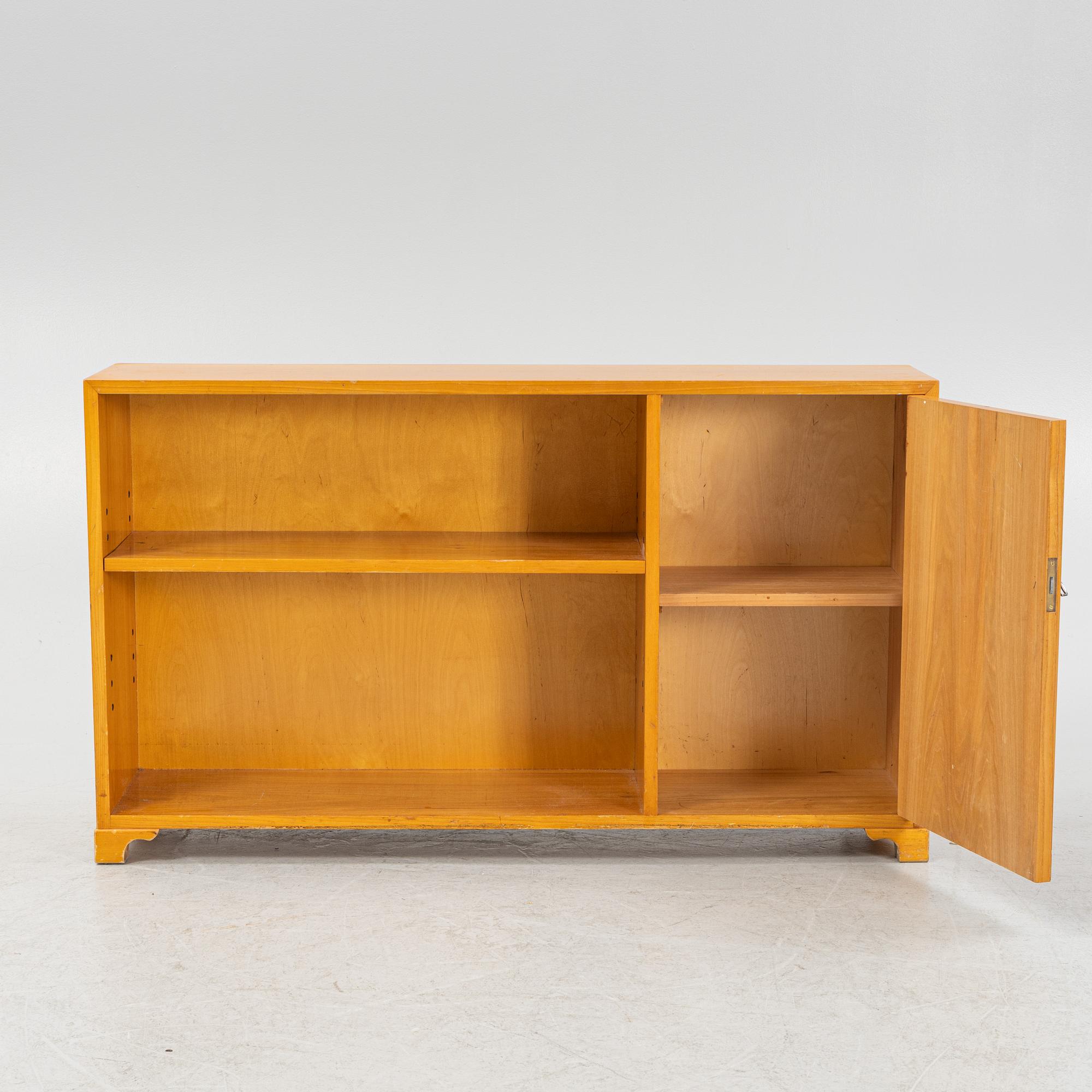 An earlier 20th century book case.