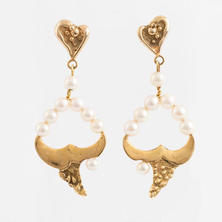 Gold and cultured pearl earrings.
