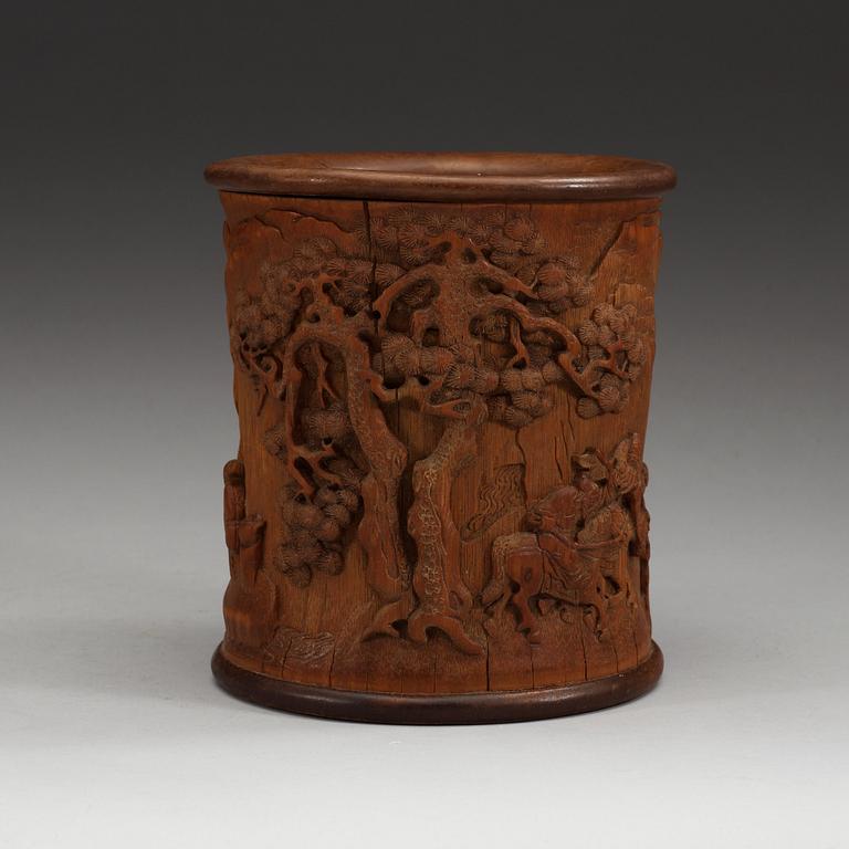 A carved bamboo brush pot, presumably late Qing dynasty (1644-1912).