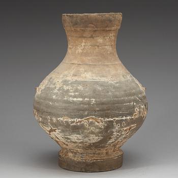 A unglazed jar, Han dynasty, (206 BC - 220 AD).