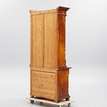 A display cabinet, late 19th century.