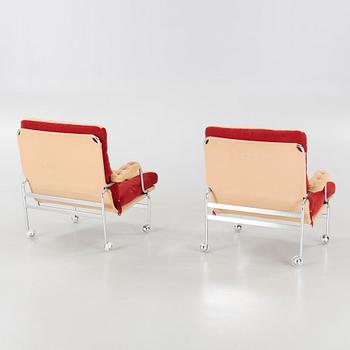 a pair of 'Karin' easy chairs byDux.