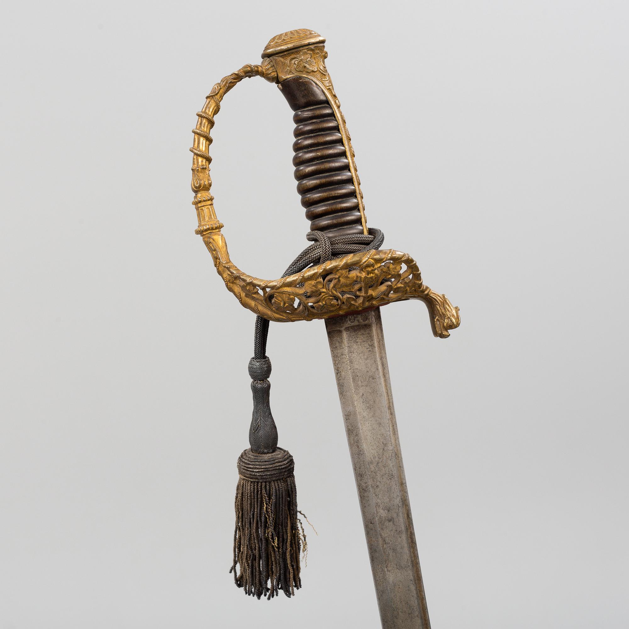 A French Navy officer's sword 1837 pattern with scabbard.