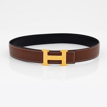 Hermès, A reversible leather and gold hardware 'Constance' belt from 2001.