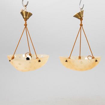 A pair of 1940s ceiling pendants.