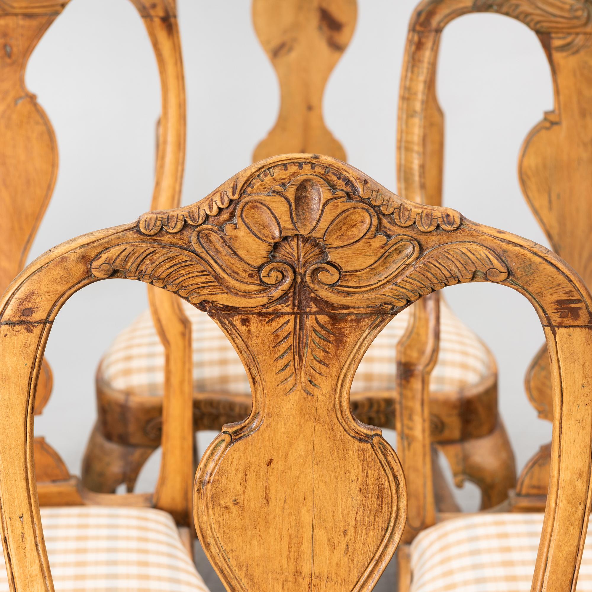 An assembled suite of ten rococo chairs, Western Sweden, later part 18th century.