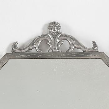 A 1920's/30's pewter mirror.