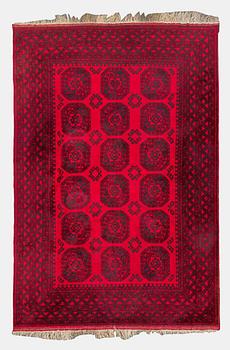 Two Afghan carpets. Ca. 326 x 217 and 88 x 63 cm.