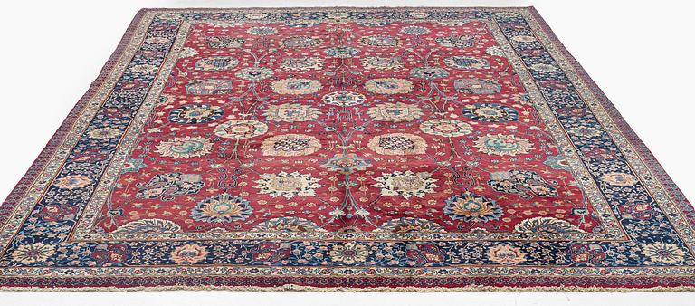 A fine Meshed carpet of 'Vase' design, North-East Persia, c. 480 x 345 cm.