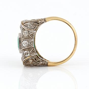 An Art deco, circa 0.70 ct, emerald and 1.00 ct old-cut diamond ring.