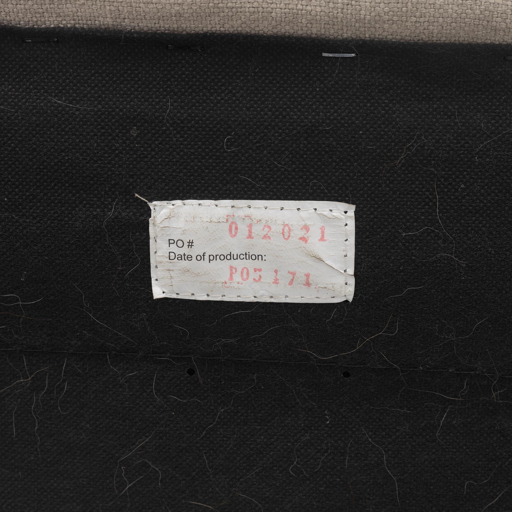 A pair of armchairs, early 21st century.