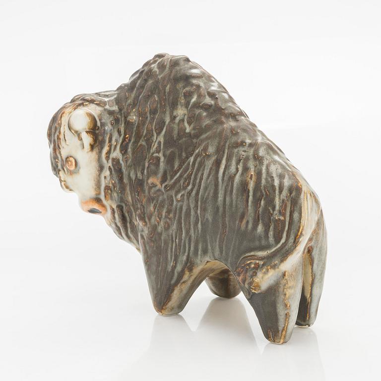 Taisto Kaasinen, A stoneware figurine, signed TK Arabia, 1960s-70s.