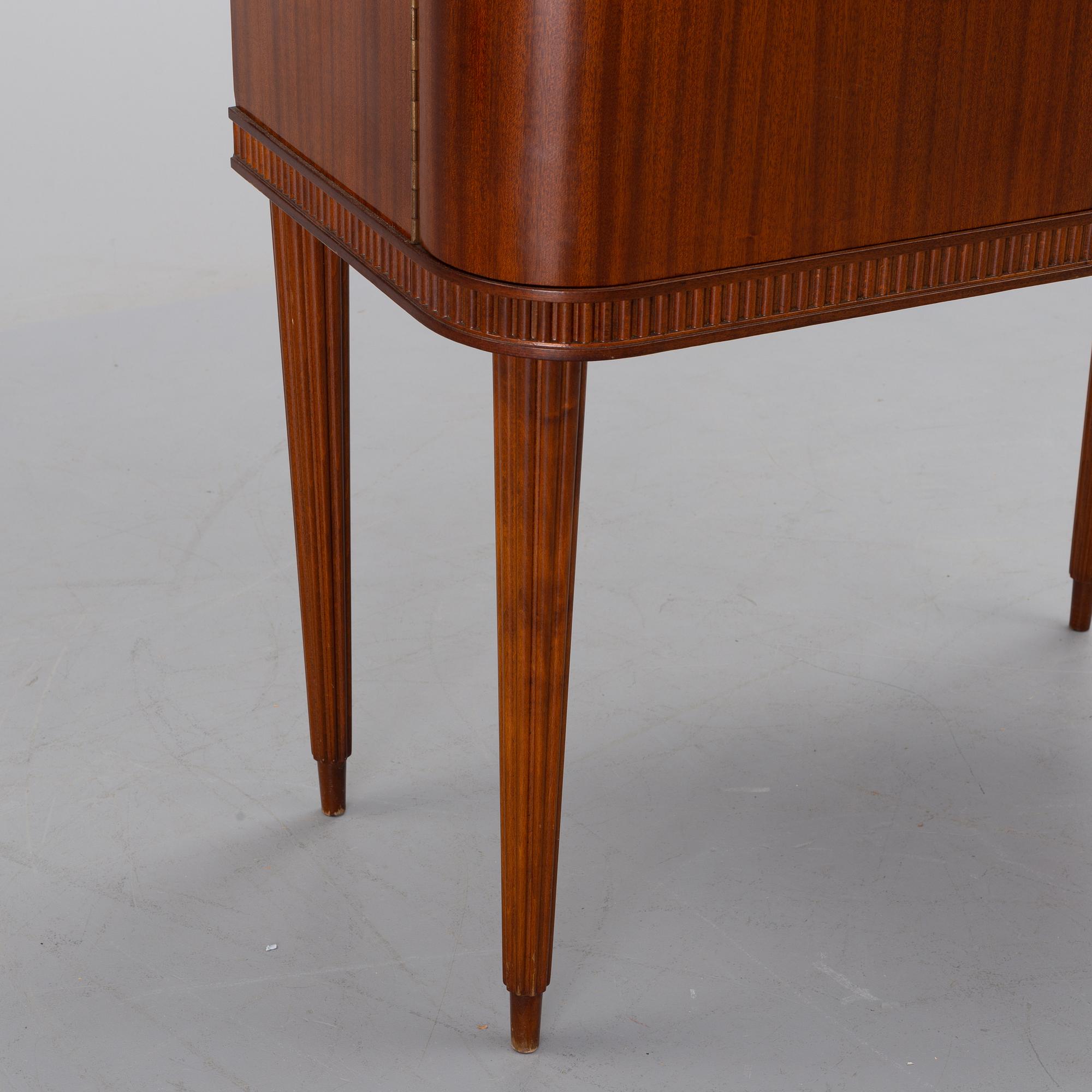 A mid 20th century drinking cabinet.