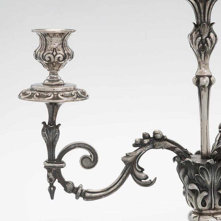 A pair of silver candelabra, maker marks of Carl Johan Tegelsten, Saint Petersburg 1850.