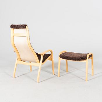 A 'Lamino' lounge chair, foot stool and side table by Yngve Ekström for Swedese.