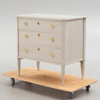 A Gustavian style chest of drawers, mid 20th century.