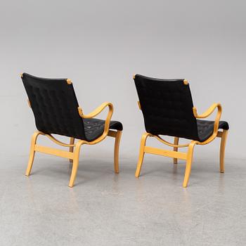A pair of 'Mina' chairs designed by Bruno Mathsson, Bruno Mathsson International, Värnamo, Sweden.