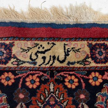 A semi-antique Mashad carpet, Eastern Iran, signed c. 507 x 303 cm.