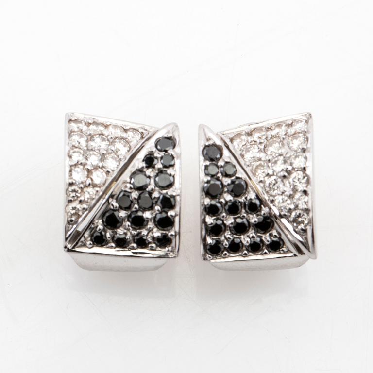 Earrings, a pair of 18K white gold set with round brilliant-cut black and colourless diamonds.