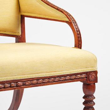 A pair of late gustavian armchairs in the manner of Ephraim Ståhl, Stockholm, circa 1800.