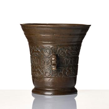 A Swedish late baroque bronze mortar and pestle, dated 1759.