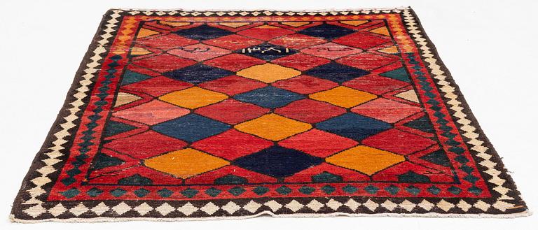 A semi antique Khersake-Bakhtiarirug, c. 211 x 162 cm.