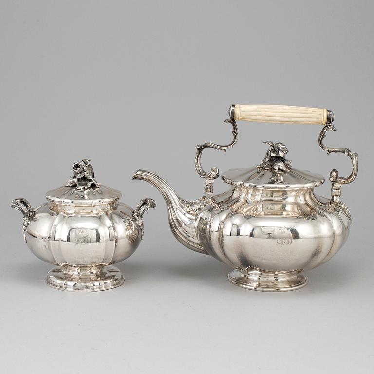 A silver teapot and sugar bowl, maker's mark of Carl Bojanowski, St. Petersburg 1851-57.