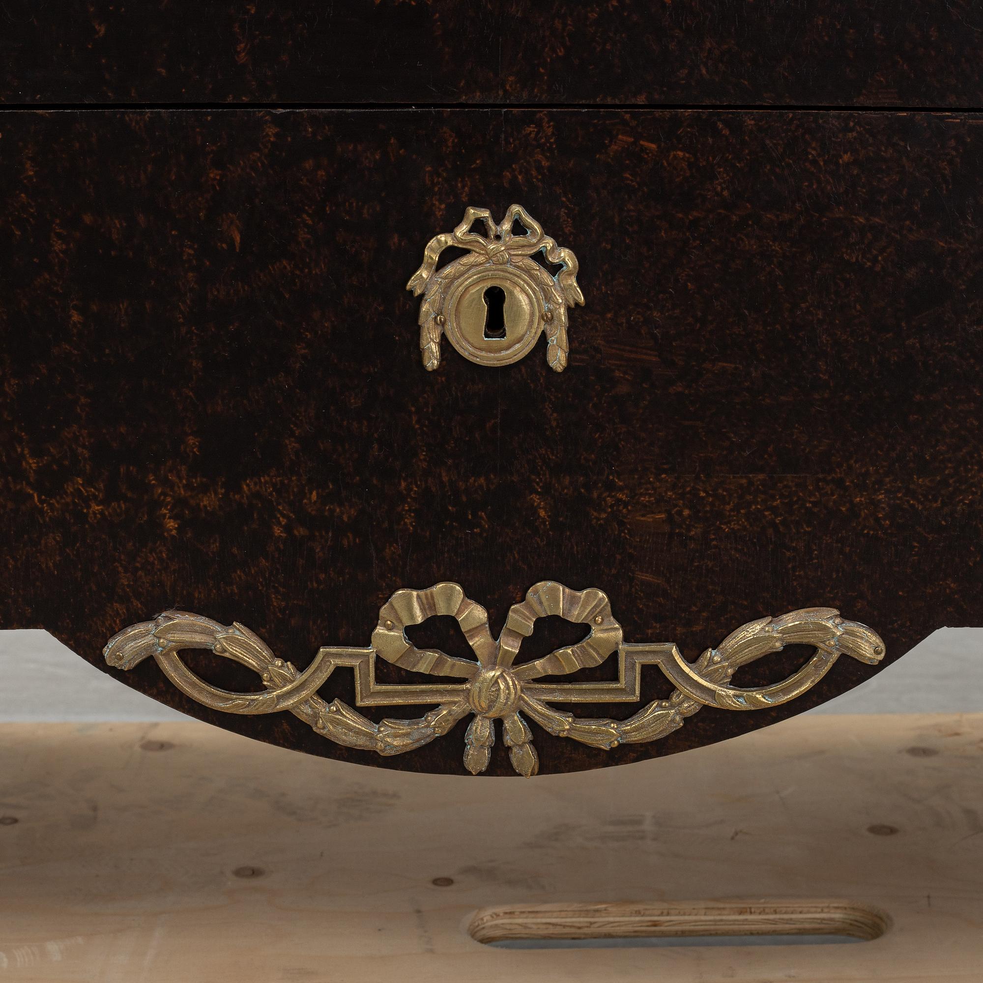 A gustavian style chest of drawers, early 20th century.