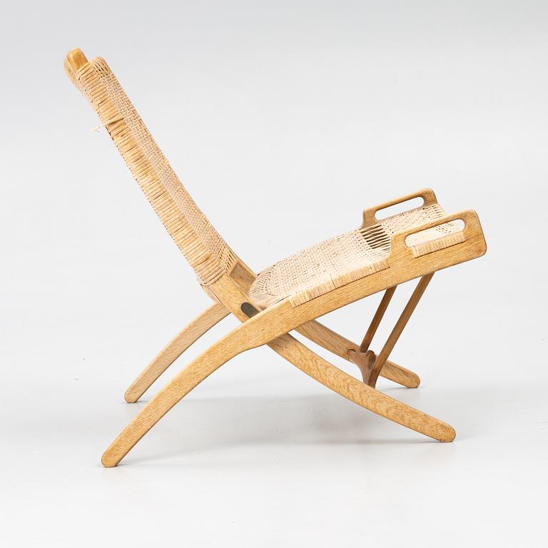 Hans J. Wegner, A folding chair, JH 512, Johannes Hansen, Denmark.