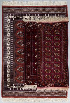 Three Afghan rugs. Ca 170x123 cm, 115x80 cm, and 117x57 cm.