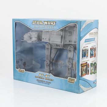 Star Wars, a set of 23 action figures and vehicles, 1970's/80's.